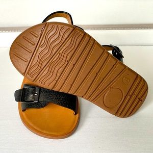 Strapy black sandals.